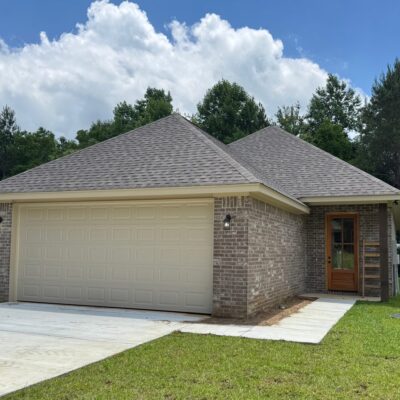 Front exterior of 44 Riviera Dr, new construction in Chateaus of Le Papillon, Hattiesburg MS